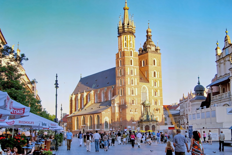 24 - St. Mary’s Basilica in Kraków, Poland, is a stunning 14th-century Brick Gothic church located in the corner of the Main Market Square